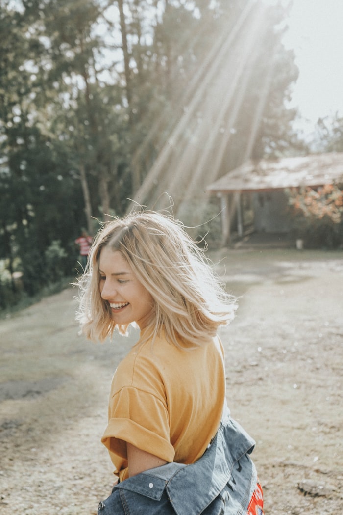 Happy woman enjoying life after weight loss